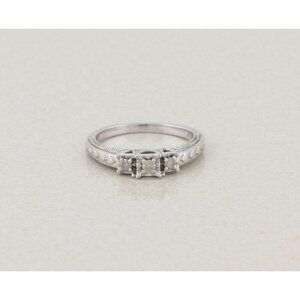 10k White Gold 1/8th Carat Three Stone Diamond Ring Size 7